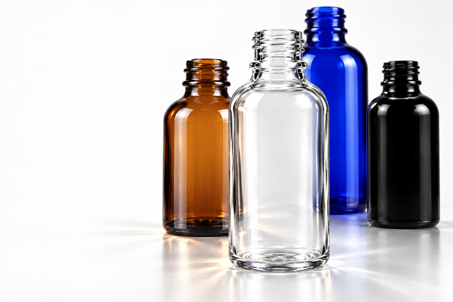 Appearance study of amber, clear, blue and black open-neck glass bottles